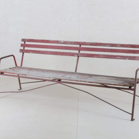 Red wooden garden bench in vintage style for rent