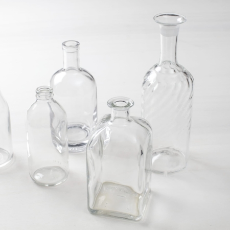 Glass bottles, glass vases, preserving jars and wedding decoration for hire