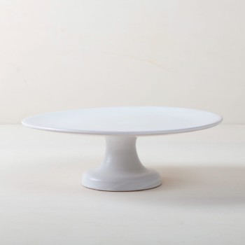 Cake Stand Ernesta Matt White L | Our medium size elevated cake stand Ernesta rests on a 13 cm high foot and has a diameter of 35 cm. Enough space to present and serve cakes, cupcakes, sushi and other delicious food on the table or at the modern buffet. The serving trays are handcrafted from high-quality terracotta and glazed matt white, of course food safe.These cake stands are available in three different sizes as well as a matt black serving plate. They can be wonderfully combined for presentations. | gotvintage Rental & Event Design