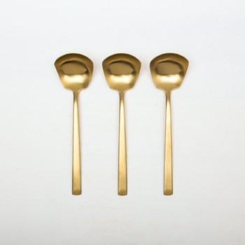 Sauce Spoon Ines Cutlery Gold Matt | With the cutlery series Ines we rent out wonderful, matt-gold stainless steel cutlery. The cutlery has a wonderful haptic and looks equally good for different types of events. Whether on a colourful table setting combined with strong colours, an elegant, minimalistic wedding or a stylish business dinner - our matt gold cutlery Ines is an excellent choice for your event.Hire the sauce spoons Ines, in addition to the golden cutlery, to thrill your guests.Matching the matt golden sauce spoons Ines we also offer vintage tableware and vintage serving bowls for rent. | gotvintage Rental & Event Design