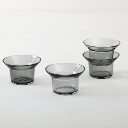 Tealight Holder Camara Grey Glass | We rent out numerous simple tealight holders made of beautiful grey glass. You would have to order the corresponding tealights separately from us. Alternatively you can use the tealight holders for small flowers. The holders have a diameter of 39 mm. | gotvintage Rental & Event Design