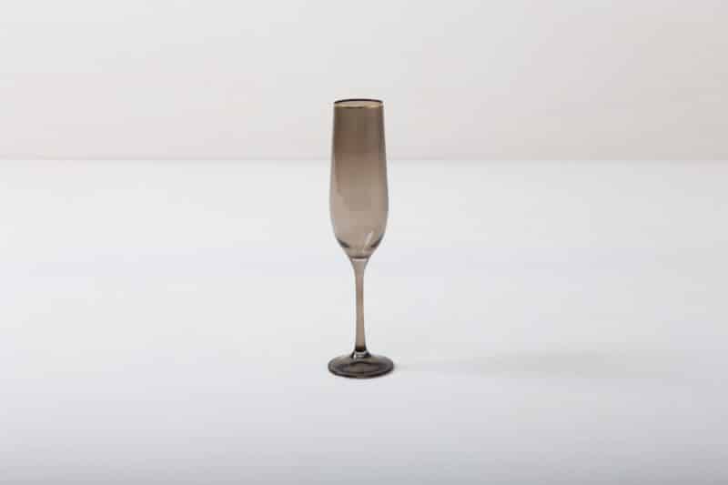 Rent champagne flute with gold rim and smoked glass look