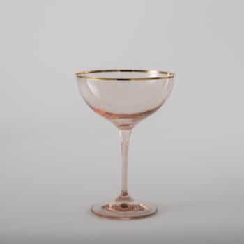 Champagne Coupe Acadia Blush Gold Rim 21cl | With the champagne bowl Acadia Blush we rent a champagne bowl with a gold rim and light pink colored glass. Whether for an elegant dinner party, a festive reception or a romantic wedding - the Acadia Blush champagne bowl is definitely something special for your event.You can rent additional glasses of the Acadia Blush series with pink colored glass to match the champagne bowl. The complete Acadia Blush series includes water cups, white wine glass, red wine glass, champagne glass and champagne bowl. | gotvintage Rental & Event Design