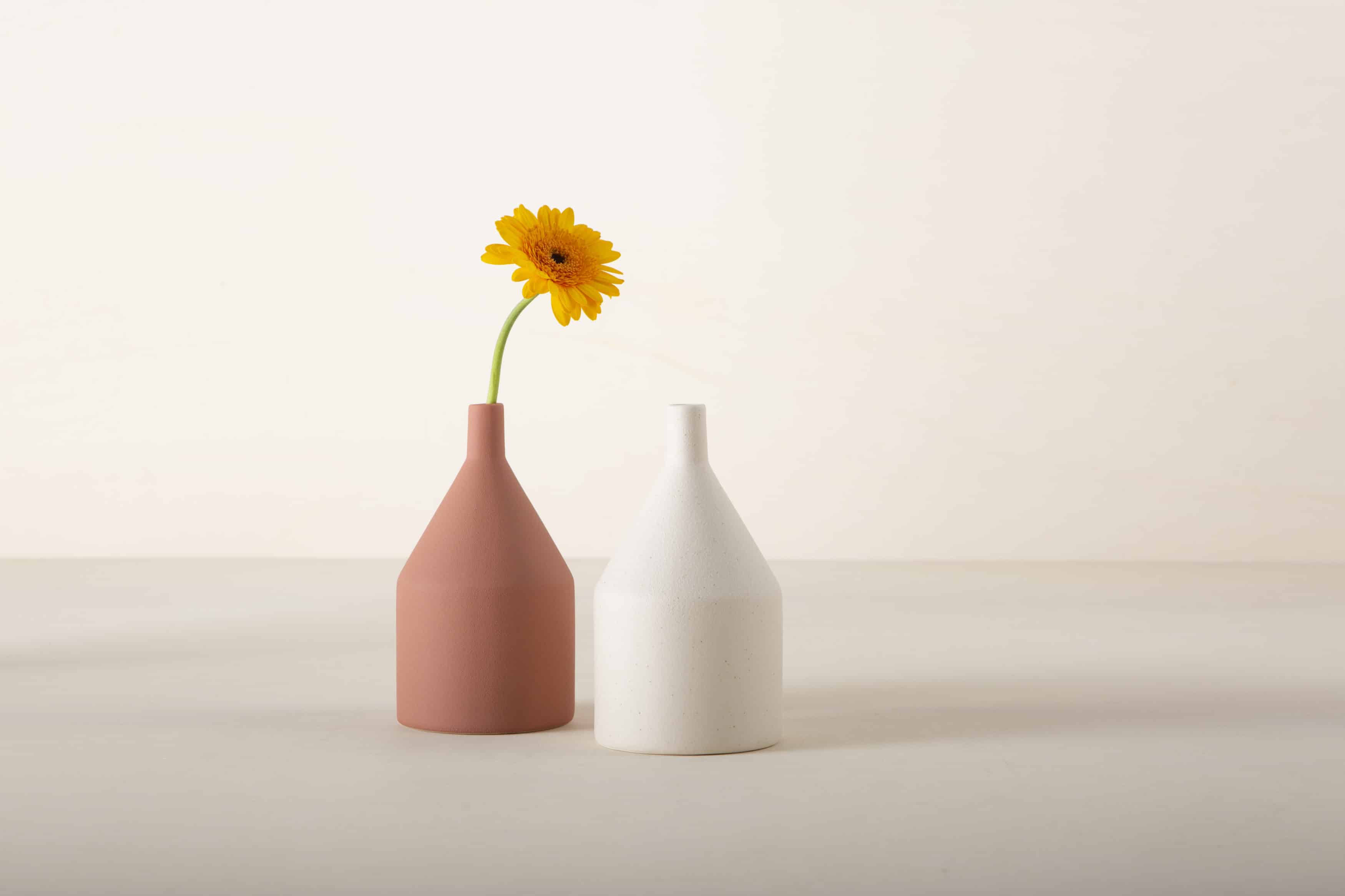  | Sometimes a single flower is all you need - or want. If you are feeling like giving the stage to one special flower rather than a full bouquet, look no further. This modern vase in matt, rough ceramic is perfect. It also comes in Terracotta, so what about a group of vases? | 