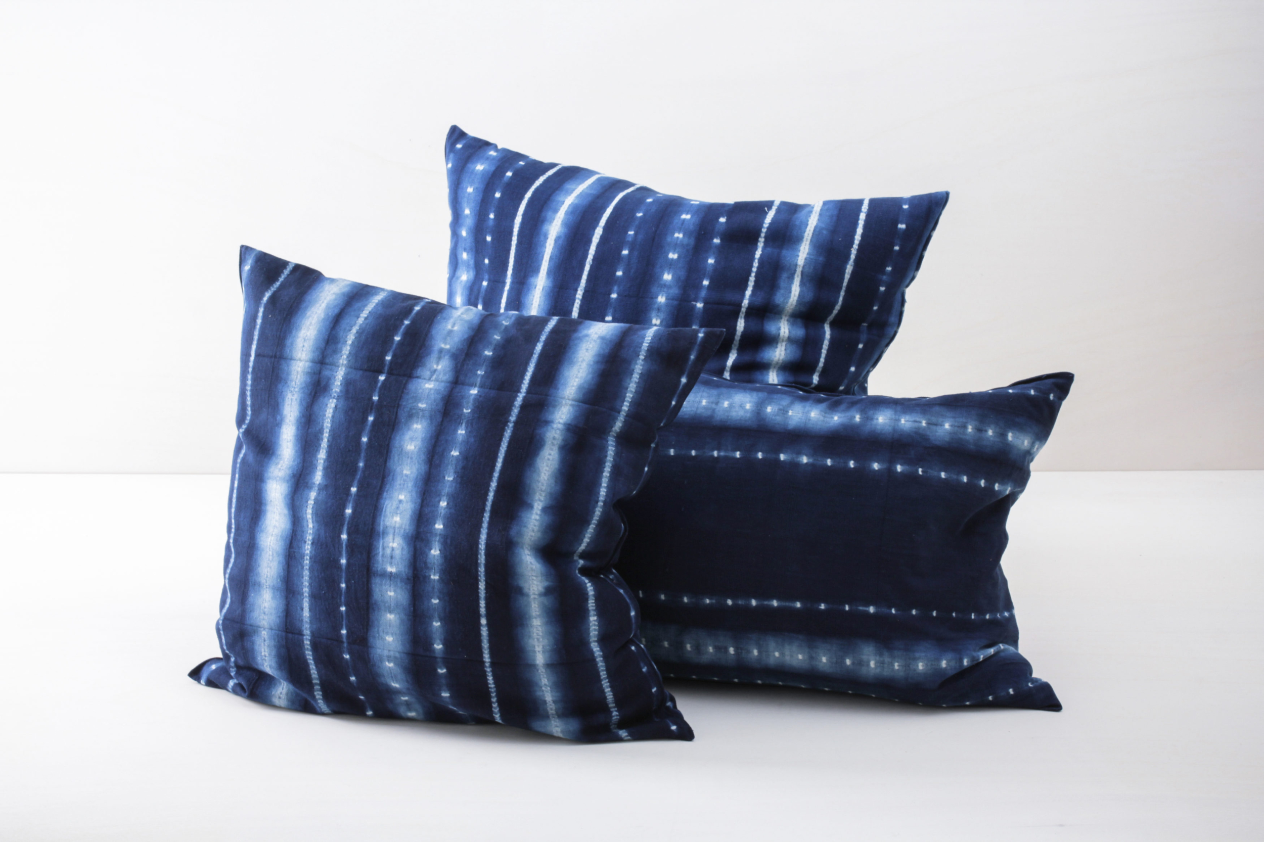  | The Vicente cotton pillows are from Guinea. The pillows are hand woven, hand dyed in indigo blue and square. The Indigo pillows are perfect for decorating lounge, picnic and garden parties.Matching the Vicente pillows we also rent out other pillows, blankets and mattresses. | 